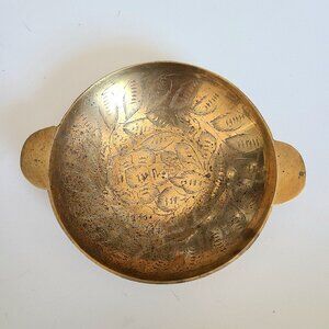 Vintage etched brass trinket dish with handles.